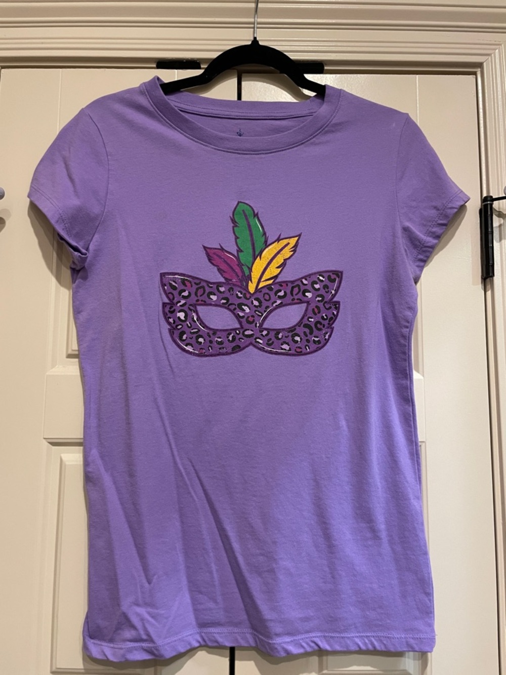 Purple Mask Graphic Tee with Colorful Feathers